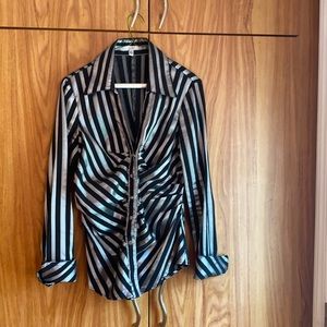 Cache blouse in excellent condition. No damage.